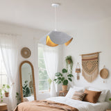 Boho woven pendant light in bright bedroom