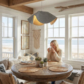 Handwoven gray pendant light in coastal dining room