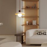 Travertine pendant light above living room side table