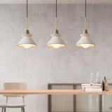 3 concrete pendant lights for kitchen island, warm wooden accents