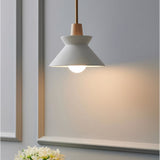 Single concrete pendant light, creamy concrete shade with wood detail