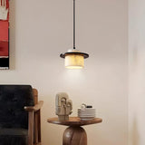 Wabi Sabi natural marble pendant light in living room reading nook, warm ambient glow