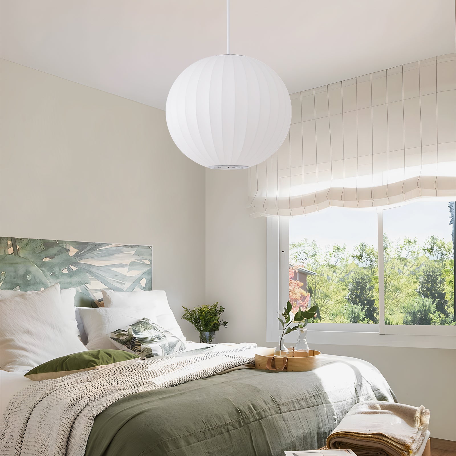 White sphere hanging lamp above modern minimalist bedroom bed