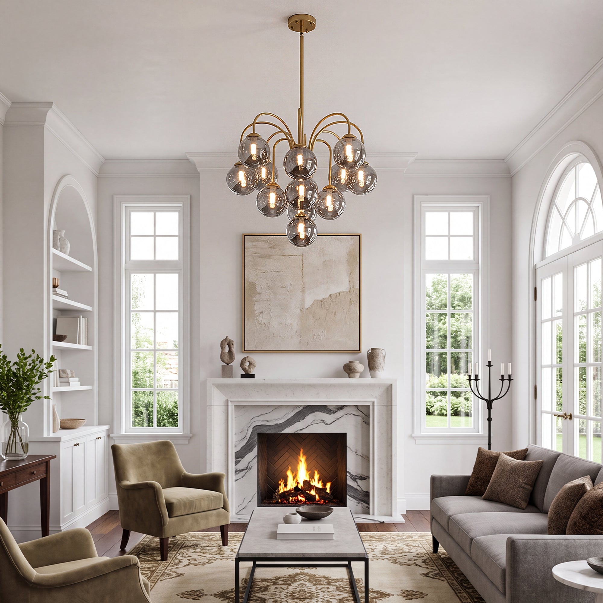 Brushed gold smoke bubble glass chandelier hanging over modern farmhouse living room fireplace