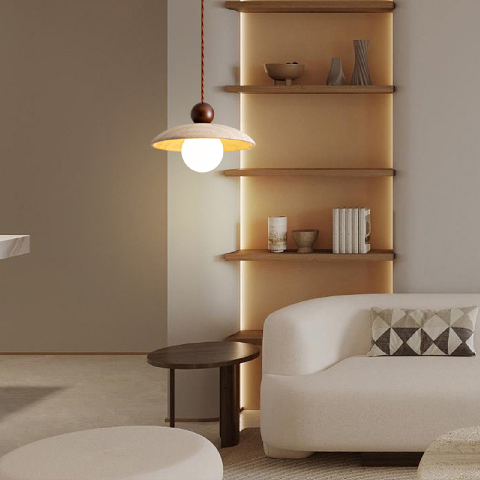 Travertine pendant light above living room side table