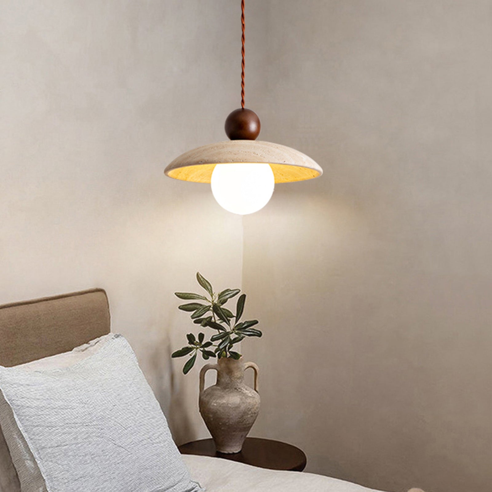 Bedside travertine pendant light with bulb, cozy nightstand decor