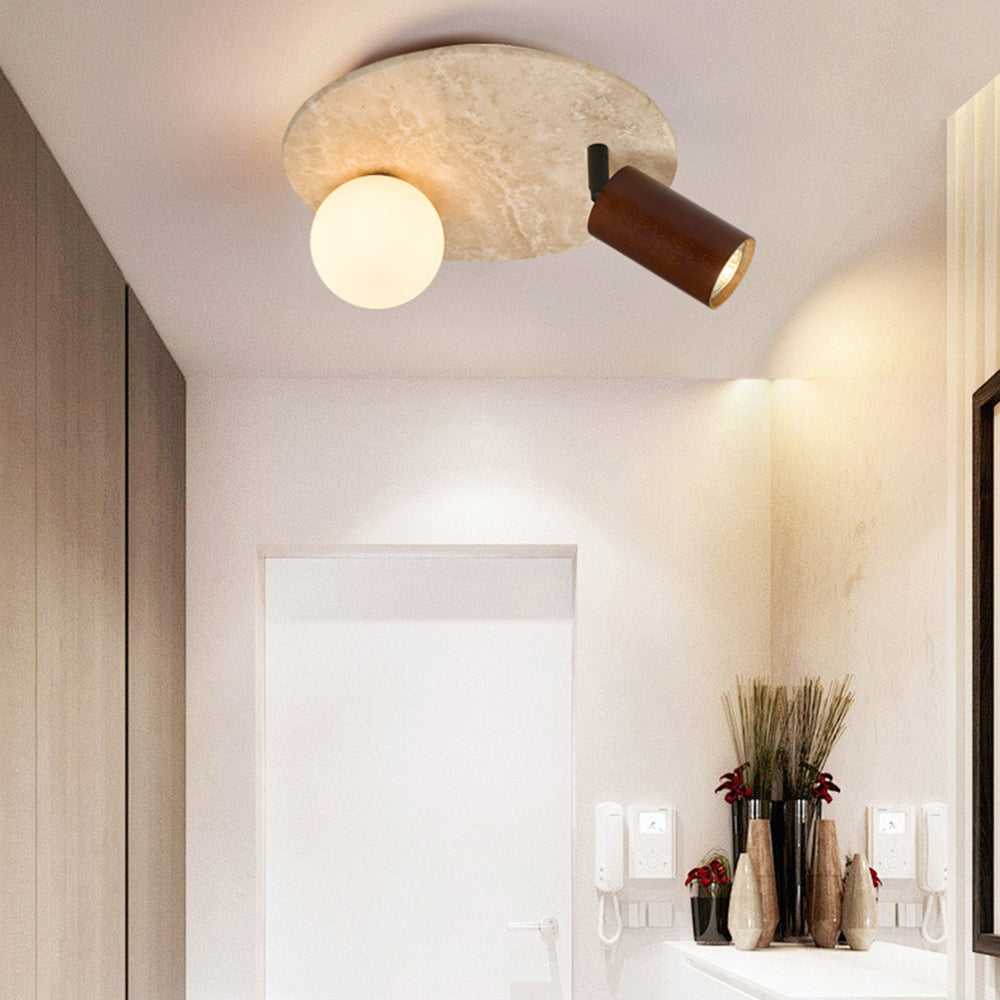 Wabi-sabi travertine ceiling light in entryway
