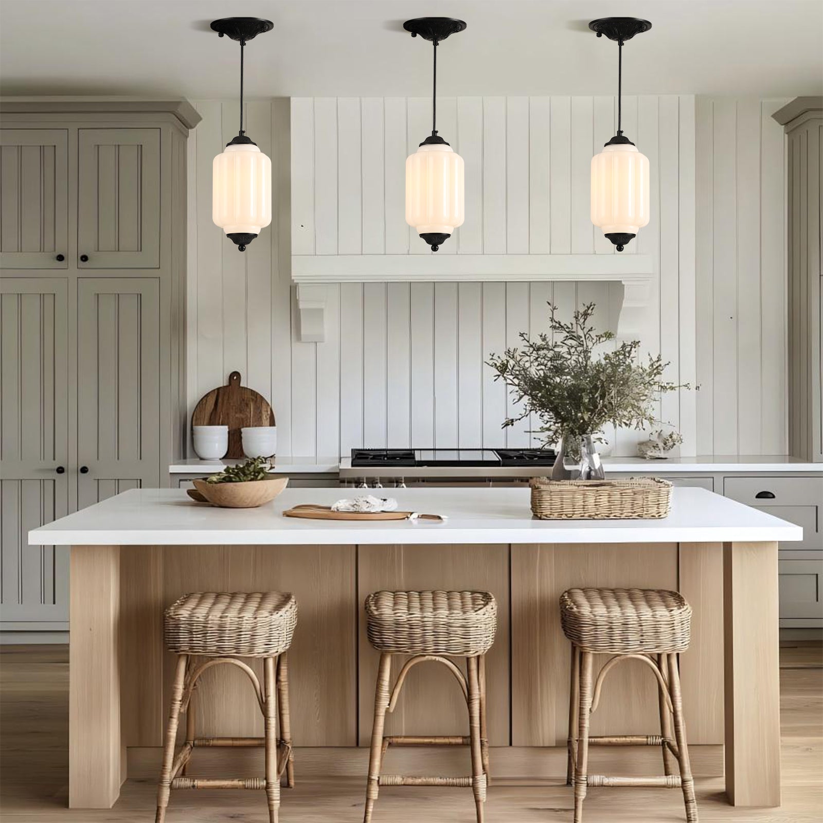 3-pack white glass pendant lights over a modern kitchen island