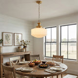 Vintage schoolhouse pendant light in dining room