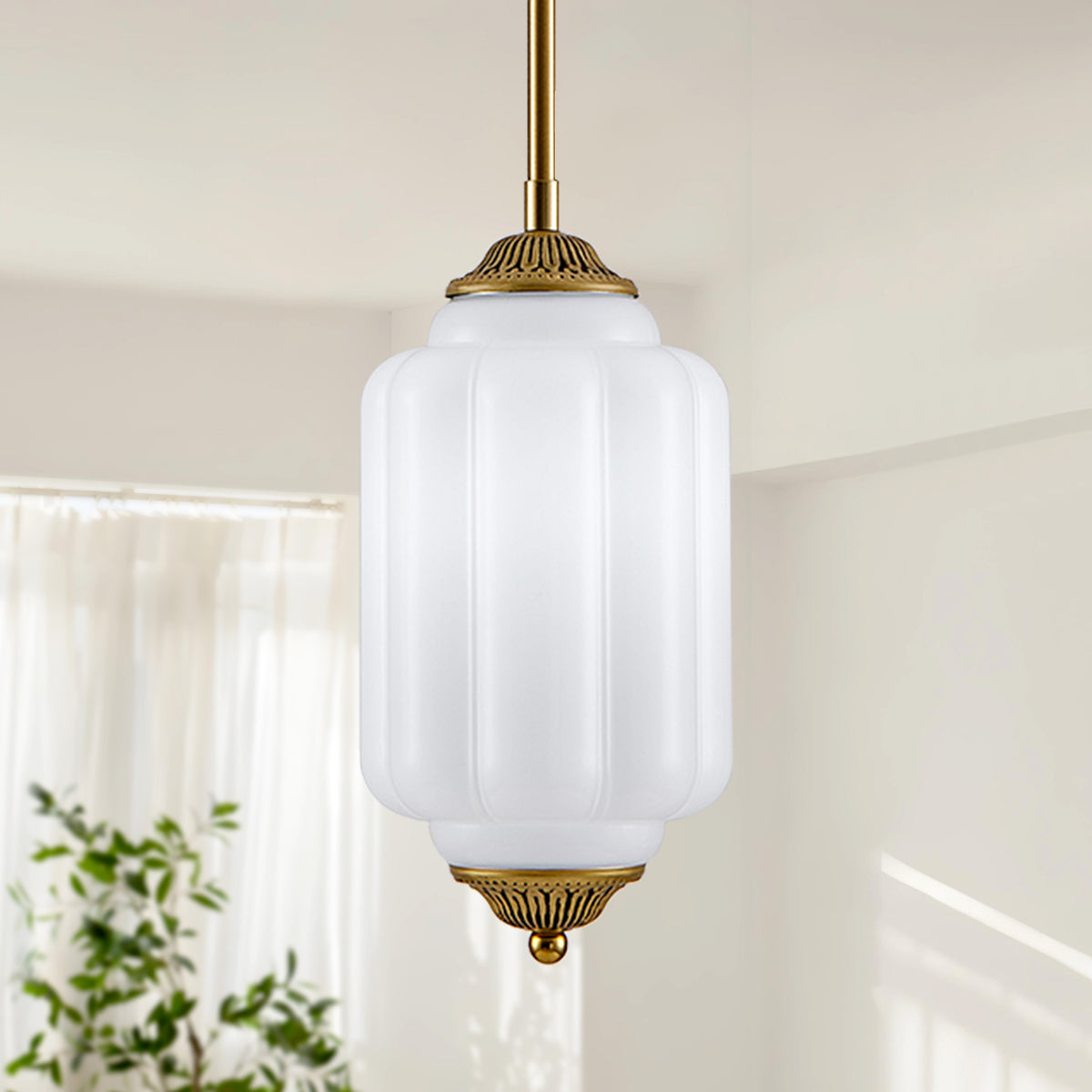 Single antique brass vertical ribbed frosted glass mini pendant light indoor white wall shot
