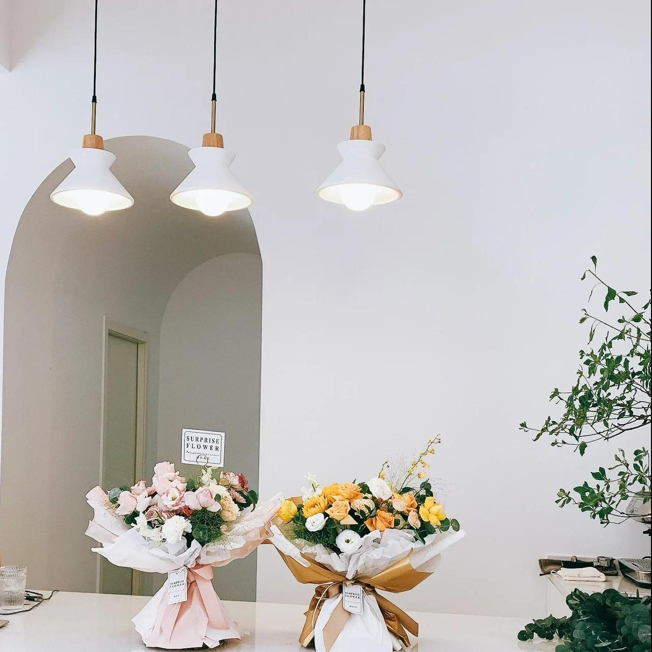 White concrete pendant lights for flower shop, minimalist aesthetic
